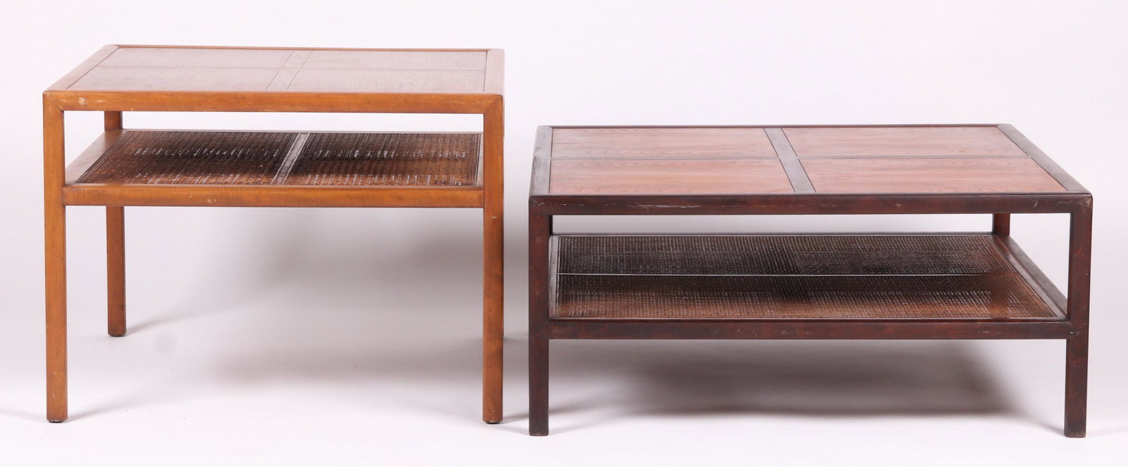 Two Baker Caned Cocktail Tables: Mid 20th century, walnut. Each with square legs, low caned shelf and a partitioned square top. Each with Baker badge as pictured. Dimensions: 30" x 30" and 22" tall and 36" x 36" and 16" tall. Provena