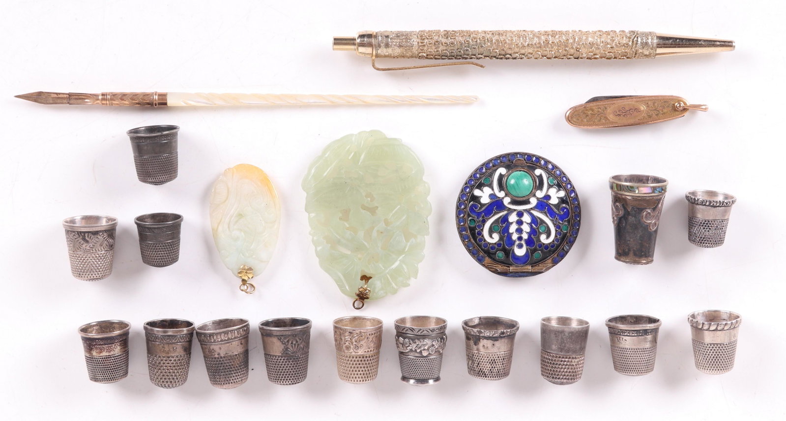 Silver, Thimbles, Pens, Estate Items: Comprising: a gold filled and mother of pearl pen with case, ten sterling thimbles, four silver plated thimbles, a gold filled pocket knife, a sterling silver ballpoint pen by Globus, a Chinese carved