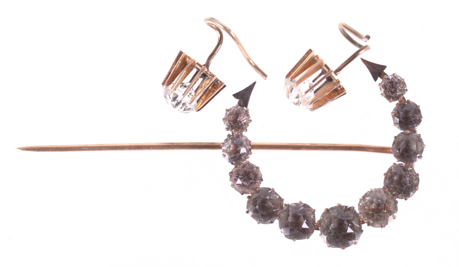 A Set of Earrings and Matching Pin, Gold and Paste: An antique set of 9k gold earrings set with glass and a similar crescent form pin in 14k gold. Dimensions: The total approximate gross weight is 4.8 dwt. Provenance: From a local estate.