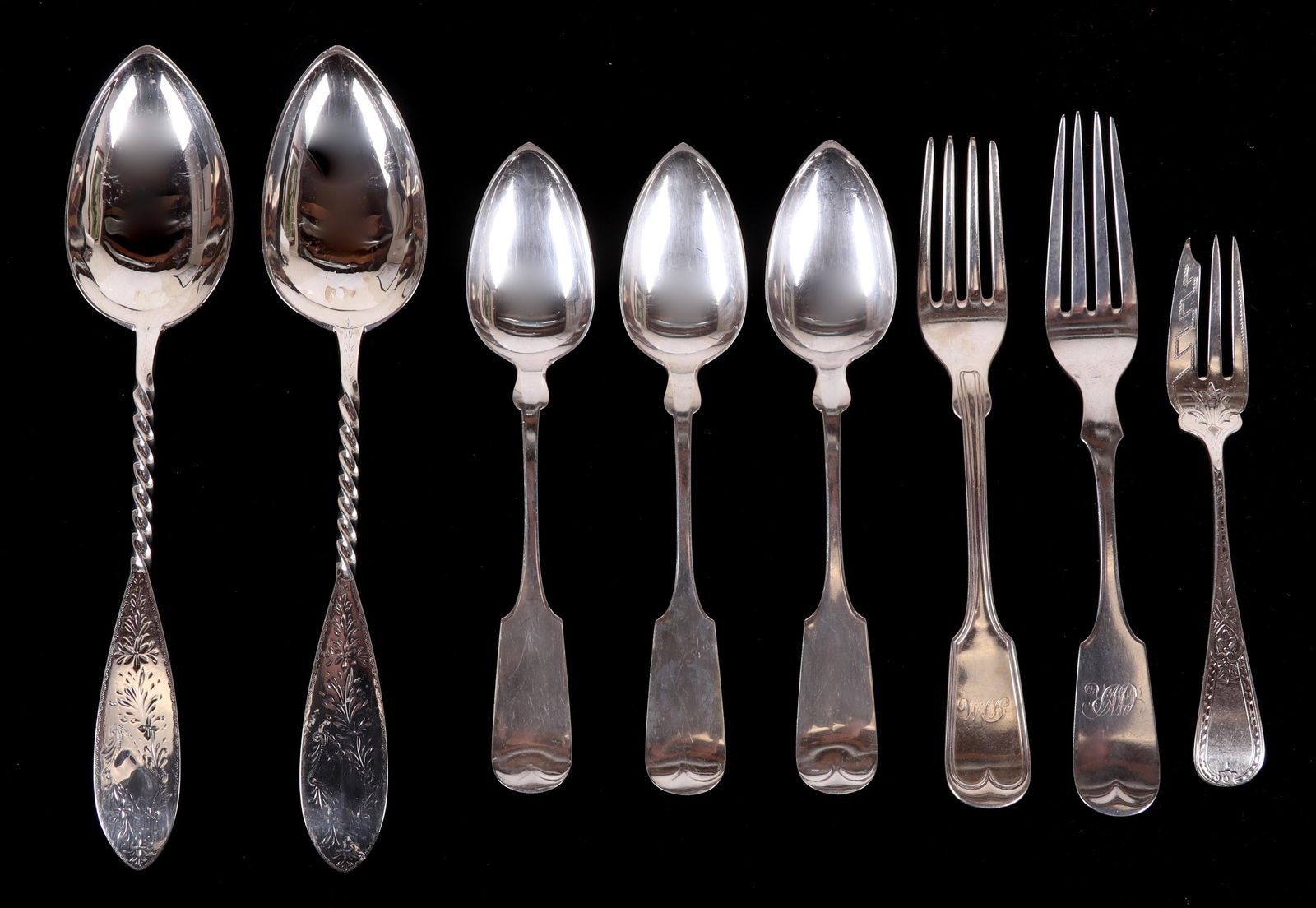 A Group of Bailey and Co. Coin Silver Flatware: Comprising: a pair of 9 1/4" spoons by George Sharp that feature twist shafts and bright-cut decoration, a bright-cut pastry fork also by Sharp, a plain fork by Sharp, and three other spoons and a sin