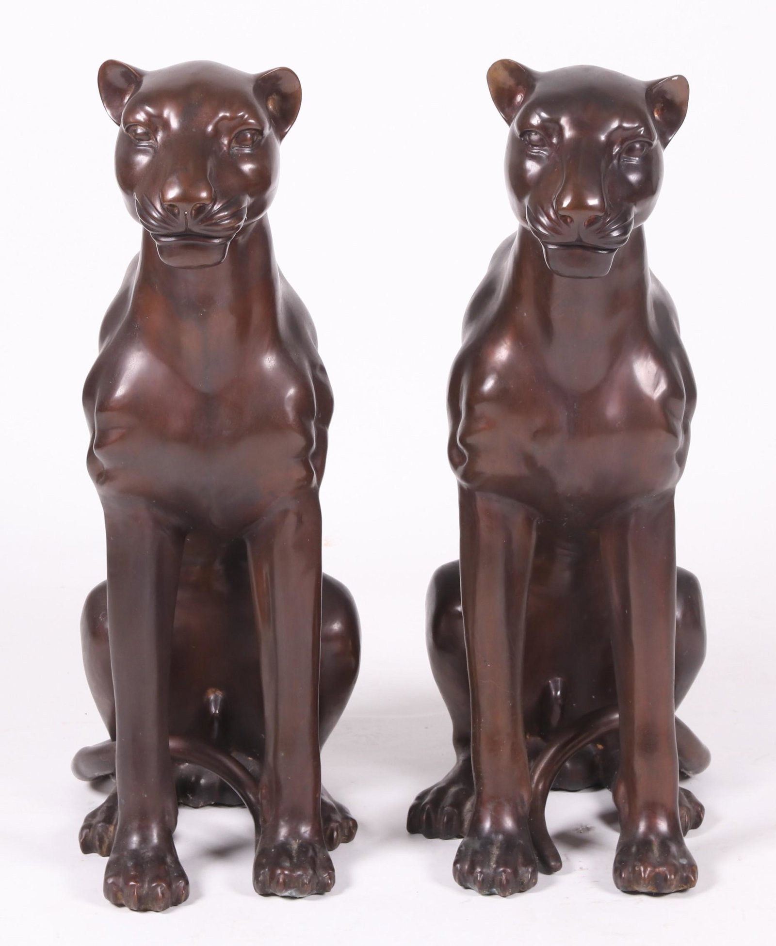 Pair of Lifesize Bronze Panthers: 20th century, unsigned. Dimensions: Each is 12" x 21" and 36" tall. Provenance: From a local estate.