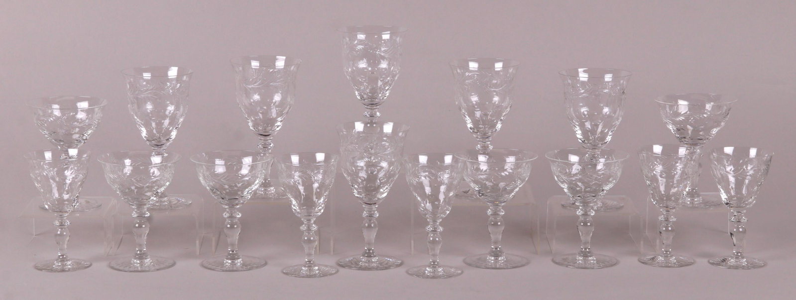 Hawkes Crystal Stemware, Christina Pattern: Each with acid etched mark. Comprising: five 5 1/4" wines, six 5" sherbets and six 6 1/4" water goblets. Dimensions: See description for measurements. Provenance: From a Main Line Estate