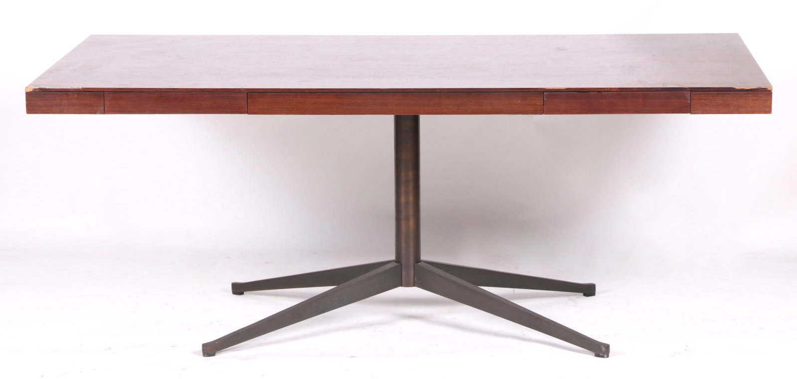 A Rosewood and Chrome Partner's Desk by Knoll: Rectangular, with two small drawers at either side and a X form base. Marked as pictured. Rosewood veneer. Dimensions: 72" x 38", the height is 28".