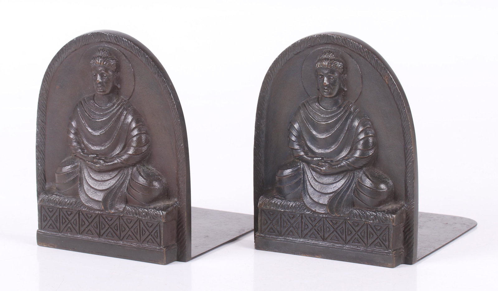 A Pair of Tiffany Studios Bronze Bookends: Each decorated with a seated Buddha, each marked as pictured. Dimensions: Each is 5" x 5 1/2" and 6" tall. Provenance: From a Pittsburgh estate.