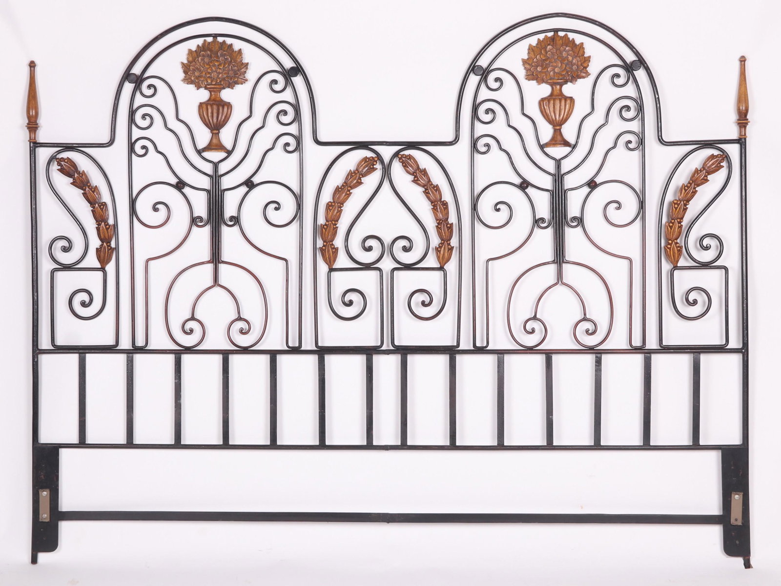 A Modern Iron and Wooden Headboard: 20th century, with scrolled, floral and foliate elements, unmarked. Dimensions: 76" x 61". Provenance: From a local collection.