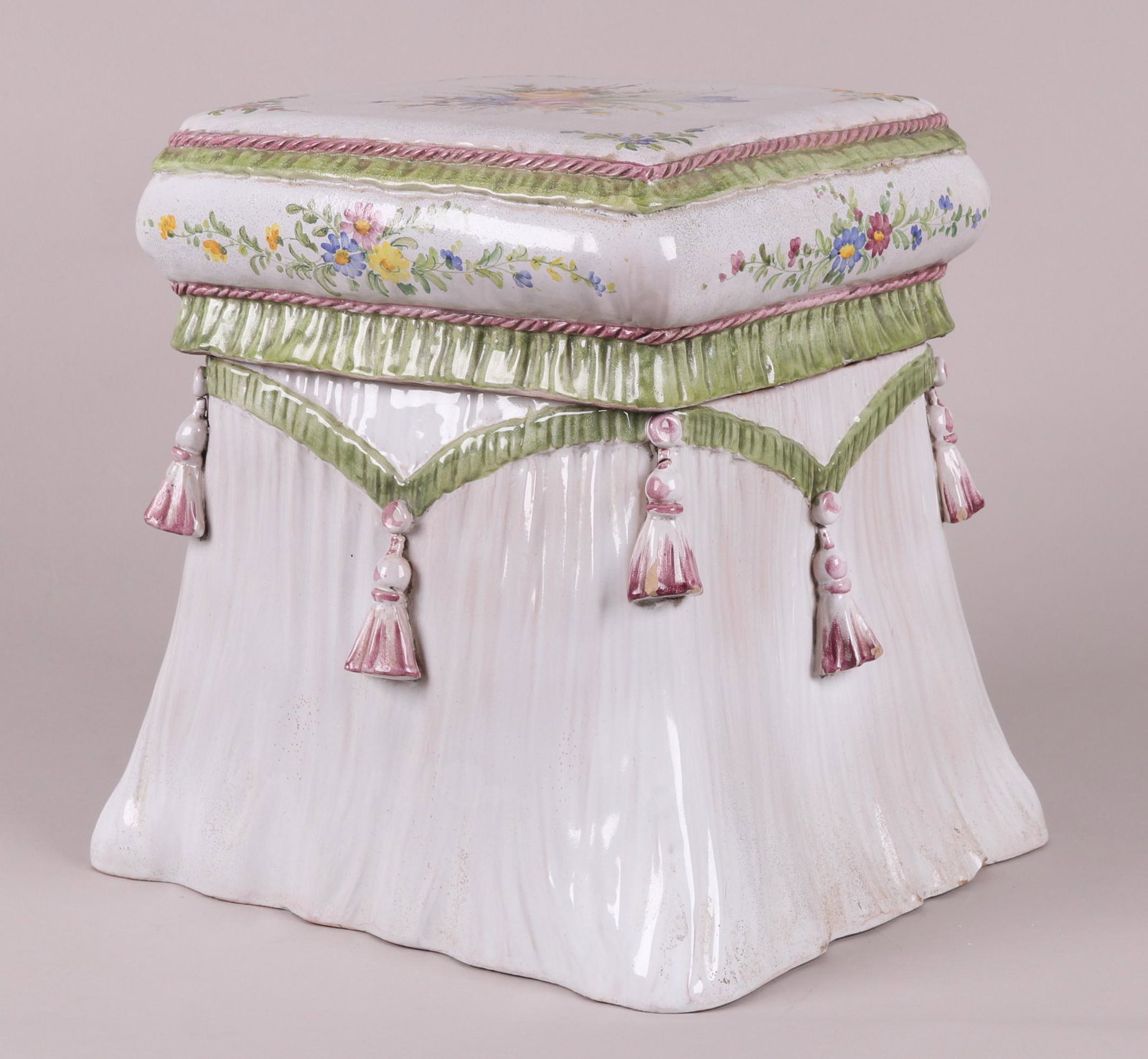 Italian Two Part Ceramic Stool: 20th century, drapery molded with hand painted floral decoration. Dimensions: 15" x 13", the height is 15". Provenance: From a Philadephia estate.