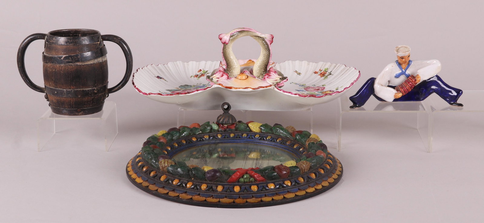 Estate Lot, Mirror, Porcelain Tray, Etc..: Comprising: a carved polychrome mirror in the Della Robbia style labeled "The Garrison Studio, Garrison -on -Hudson" verso, a barrel form sterling mounted cup with two open handles, pottery figure of 