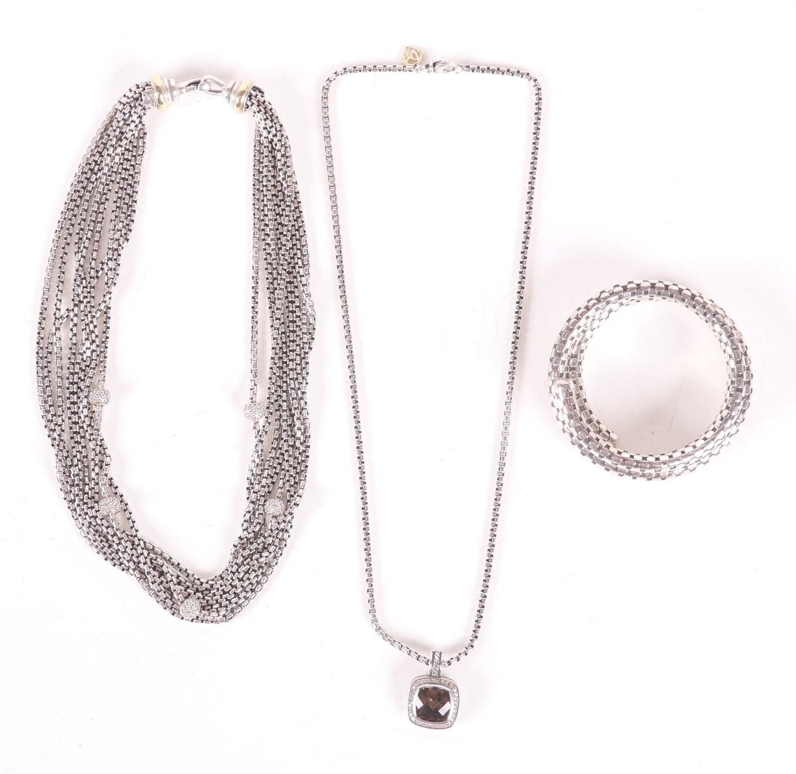 Two Pieces of David Yurman Sterling Gold Jewelry: A sterling chain with pendant and small 14k gold lenk and a heavy choker necklace with beads and 18k gold rings at the clasp. Together with a sterling coil bracelet that is simply marked 925. Dimensio