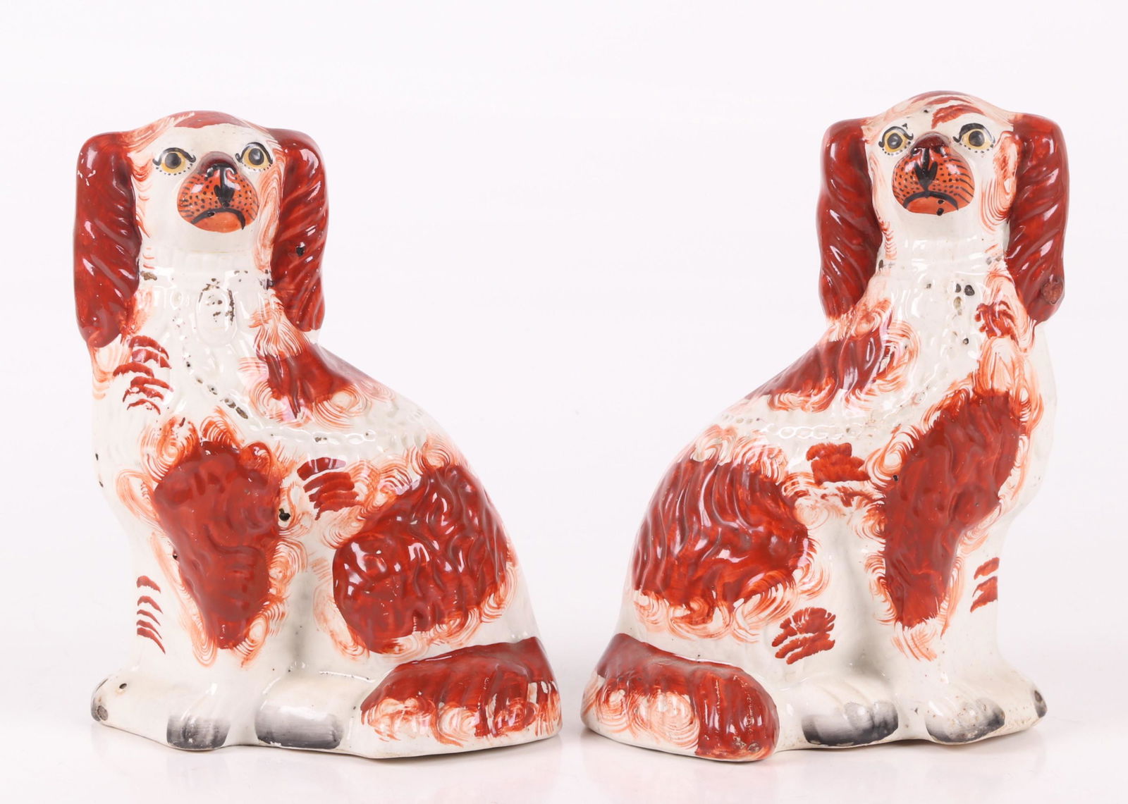 A Pair of Staffordshire Pottery Spaniels (1 of 5)