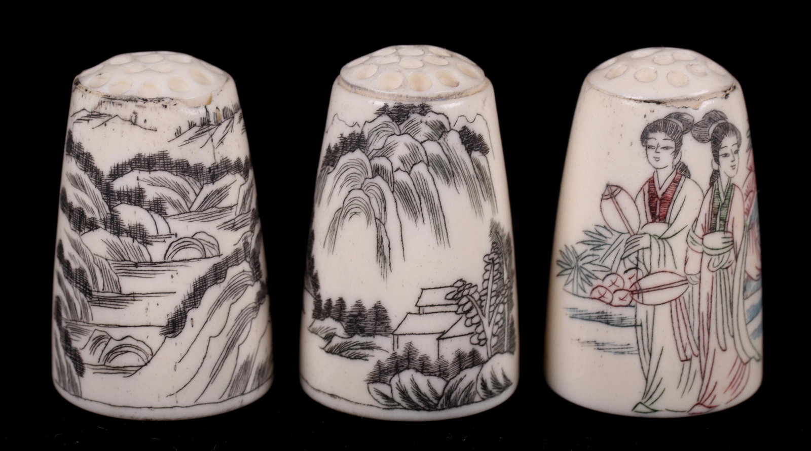 Three Chinese Bone Thimbles: Each with etched figural decoration and in a presentation box, late 20th century. Dimensions: The box is 4" x 2" x 1 1/4". Provenance: From a local estate.