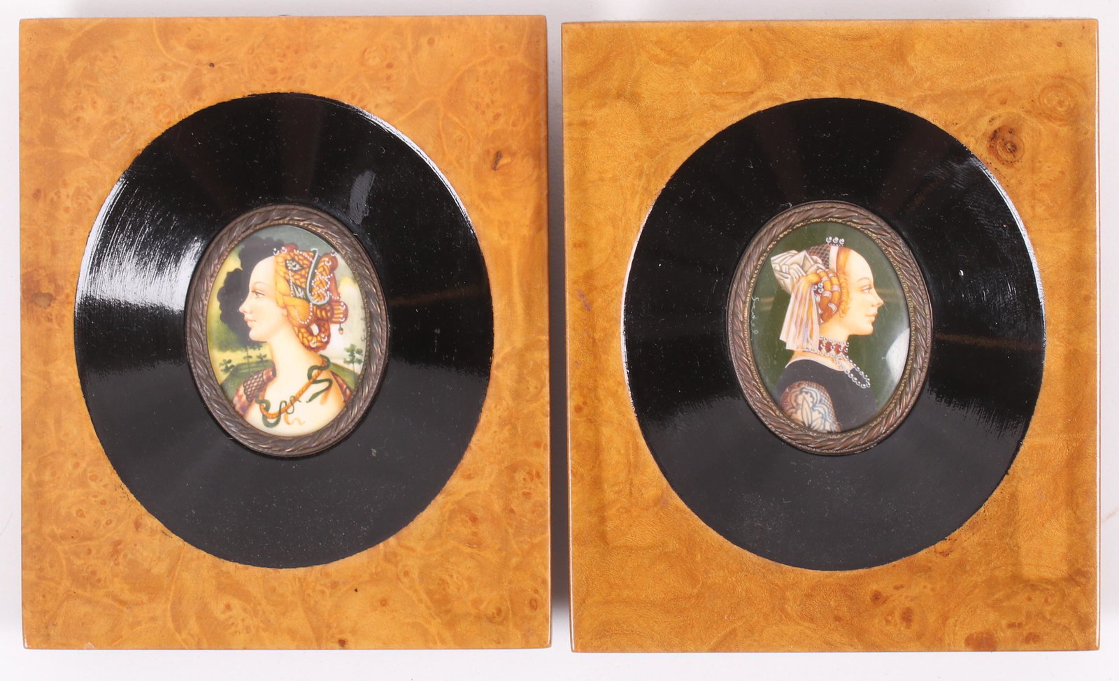 A Pair of Renaissance Revival Portrait Miniatures: 20th century, one illegibly signed, on matching burlwood frames. Dimensions: Each frame is 4 1/2" x 4". Provenance: From a local collection.