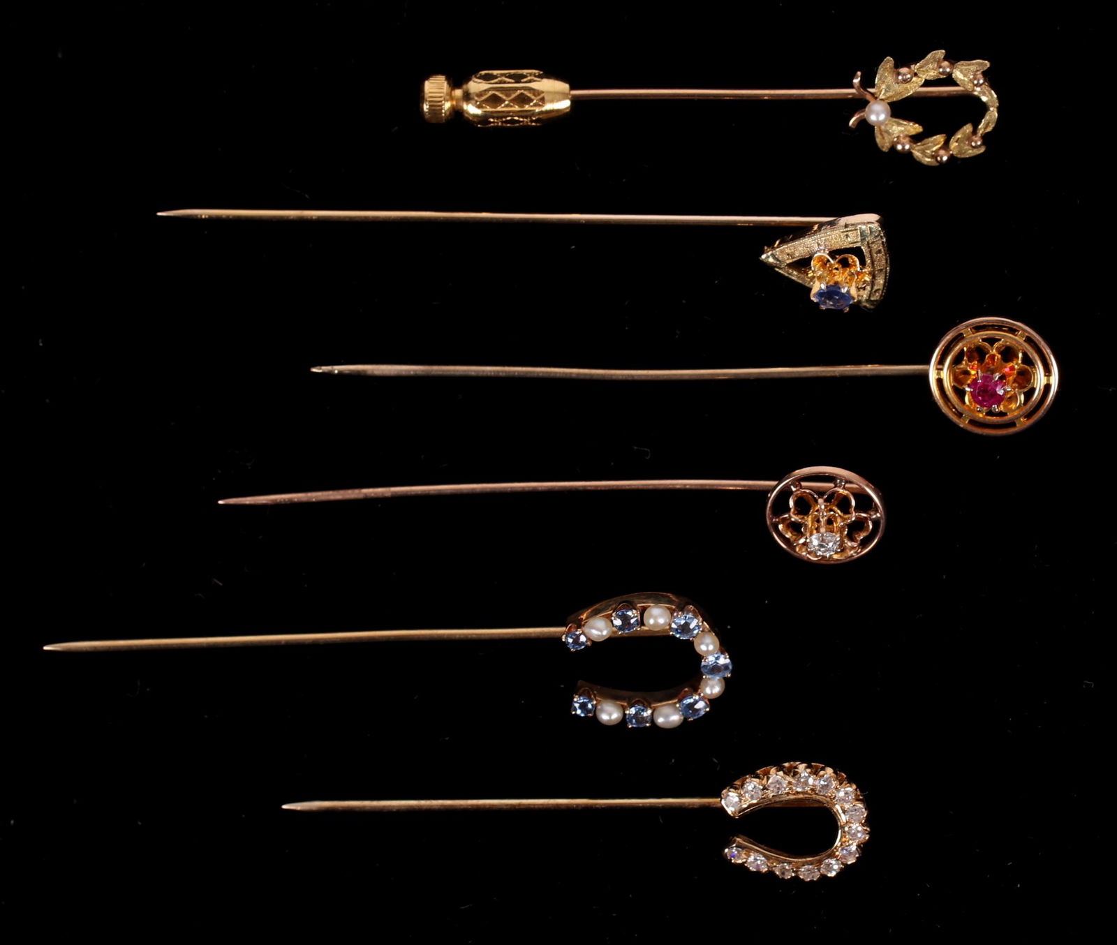 A Collection of Six Gold Stick Pins (1 of 9)