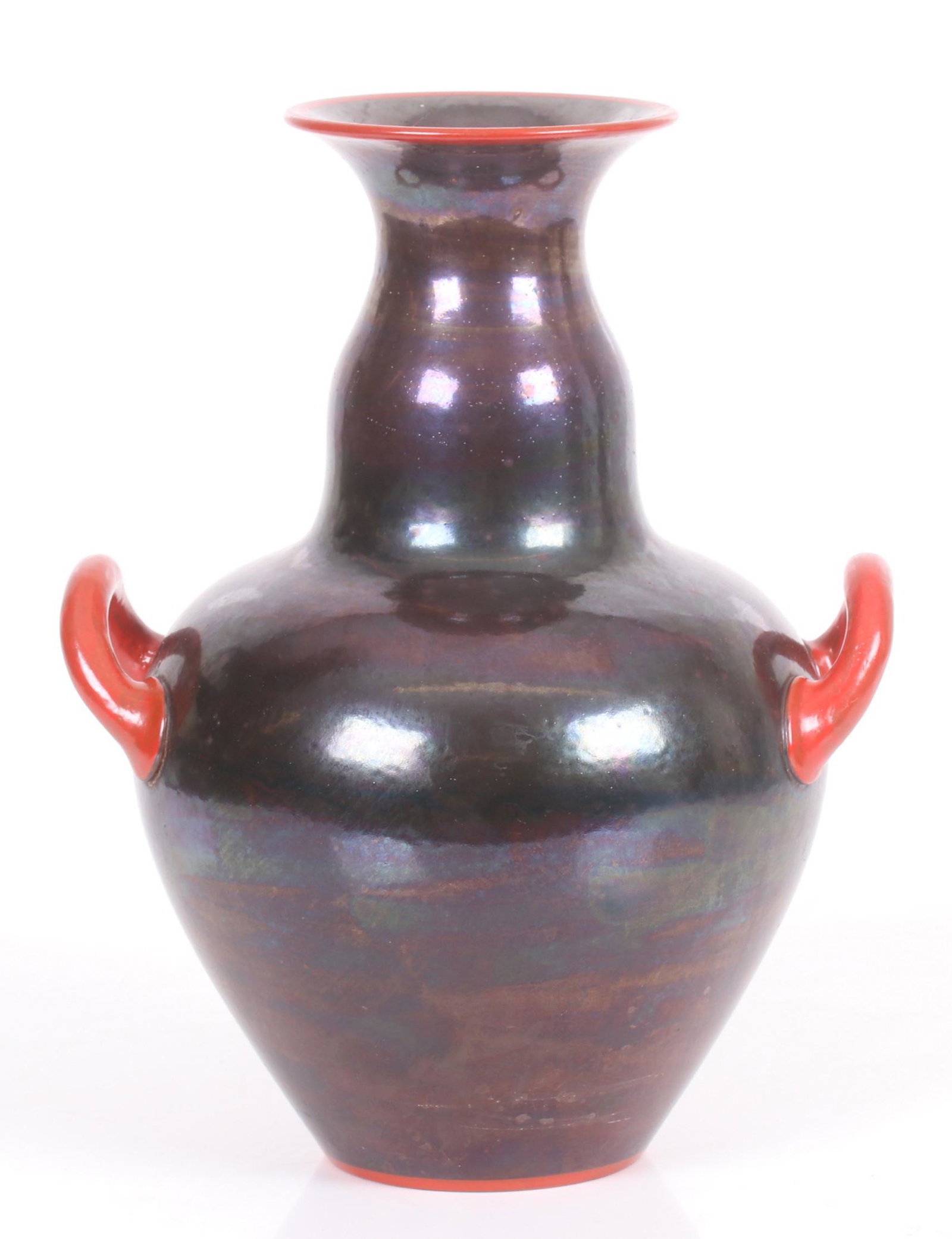 Richard Ginori, Iridescent Art Deco Vase: Having an iridescent glazed clay body and red-painted handles & rims. Marked on the base. Early to mid 20th century. Dimensions: Measures 12.5" H x 10" W handle to handle. The body has an 8" diameter.