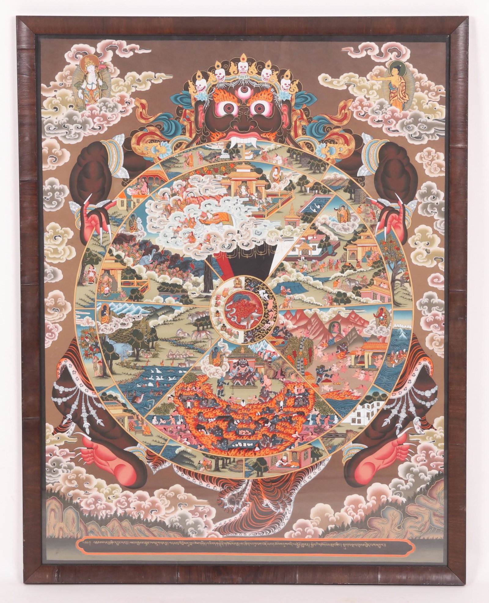 A 20th Century Tibetan Thangka Painting: Depicting Buddhist imagery. Stamped en verso Naropa Thangka Store / Thamel, Kathmandu,Nepal Dimensions: 37" H x 29" W framed, 35" H x 27" W image.