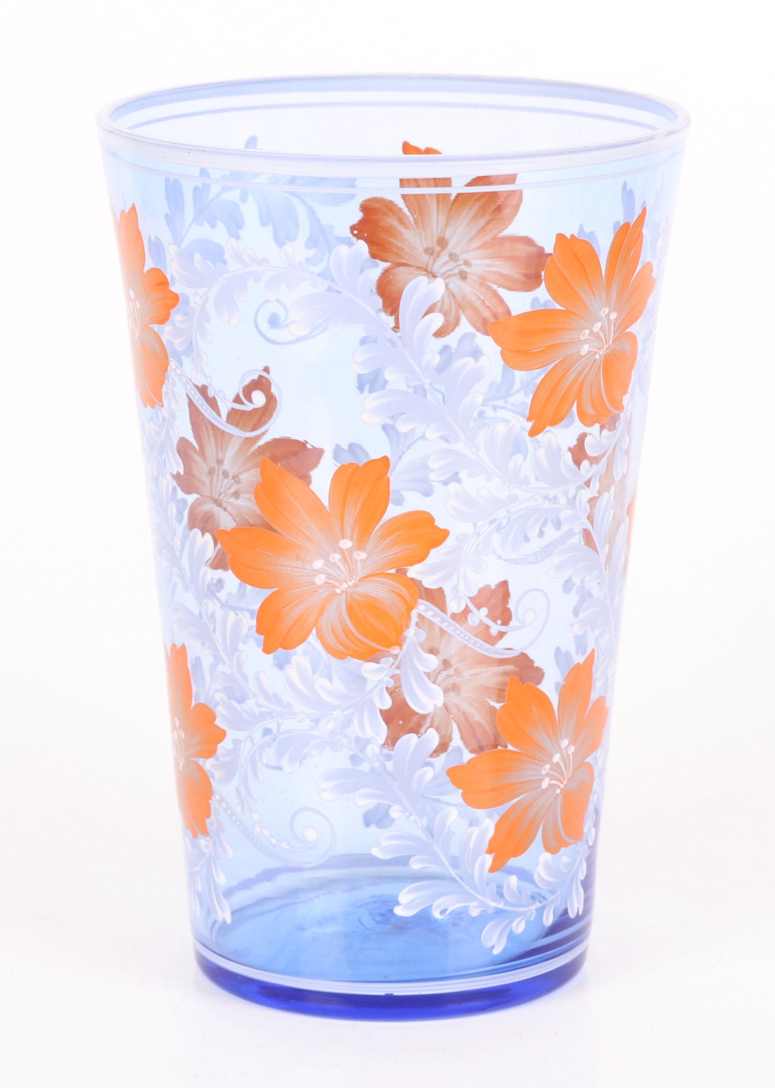 A Large Continental Glass Beaker: Light blue glass with polished pontil mark and decorated with flowers and scrolled leaves. Dimensions: Excellent condition, no damage or repairs. Provenance: From a local collection.