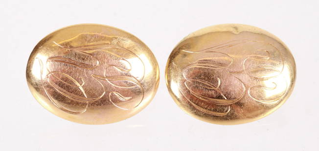 A Pair of 10k Gold Earrings: A pair of screw back earrings with 10k gold fronts and 12k gold filled screw backs, monogrammed. Dimensions:Each is 3/4" x 9/16, the approximate gross weight is 3 dwt. Provenance:From a NJ