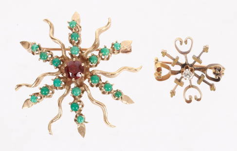 Two 14k Gold Sunburst Pins: The smaller example is Victorian period and features a mine cut diamond, the large is a Victorian revival piece and features turquoise and garnet. Dimensions:The smaller is 3/4" in diameter, the