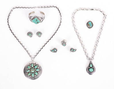 A Group of Navajo Sterling Jewelry, Frank Patania: A large circular pendant on a heavy chain, a teardrop pendant on a heavy chain, and two pairs of earrings, all signed for Frank Patania. The lot also includes an unmarked cuff bracelet, an unmarked