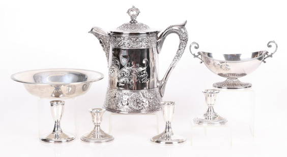 A Group of Sterling and Silver Plated Tableware: Comprising: a good Victorian period silver plated water pitcher by Web, a silver plated sauce boat by Barker-Ellis, a pair of weighted sterling candlesticks by Preisner, another weighted sterling pair