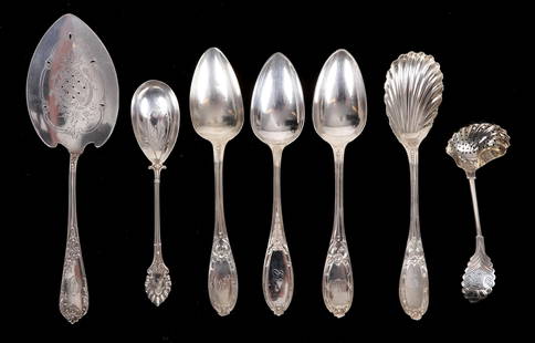 American Coin Silver Table Spoons, Etc.: To include a David Anderson .830 silver pastry server, Norway, 1897, a Knowles & Ladd bright cut ice cream server, a pierced coin silver ladle, and four Jenny Lind pattern coin silver table spoons.