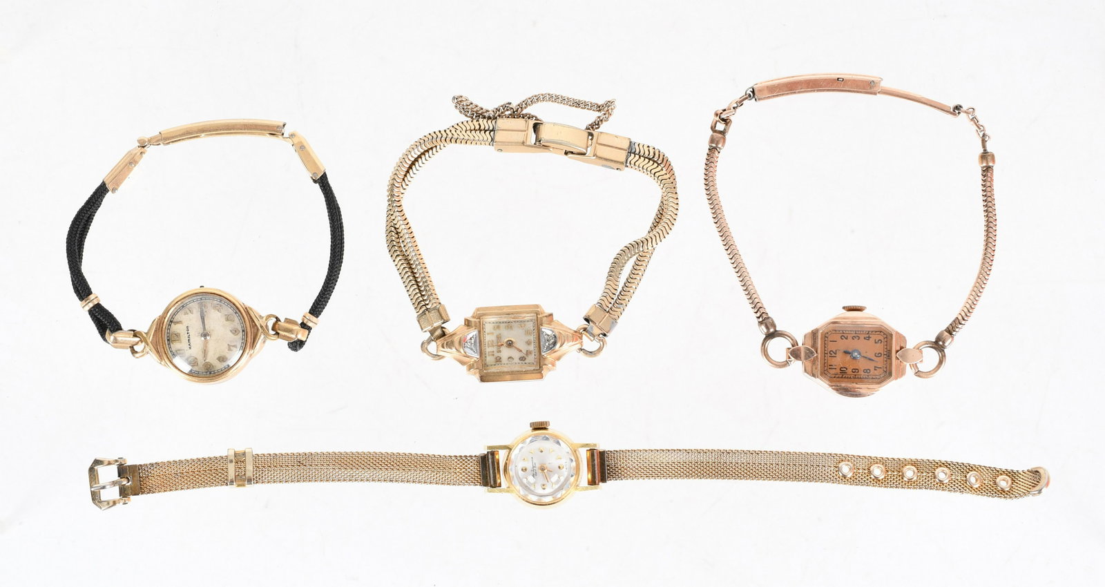 Four Ladies Wristwatches: Examples by Bulova, Hamilton, Jules Jurgensen and Liban, the Jurgensen and the Liban have gold cases. Dimensions:Various. Provenance:From a Bucks County estate.