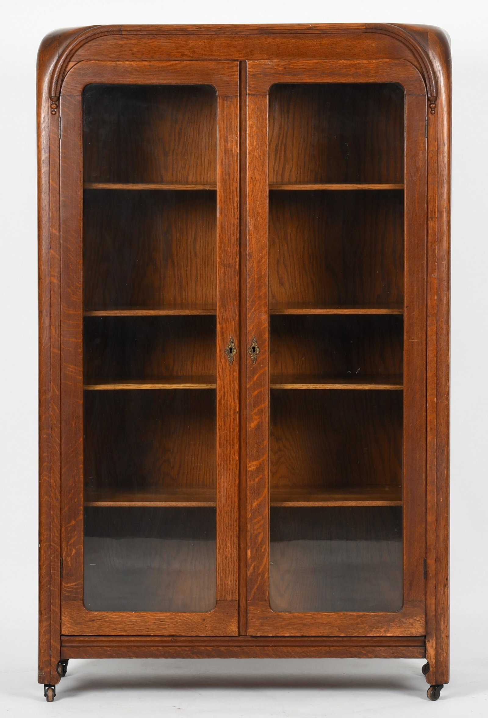 An Art Deco carved oak bookcase (1 of 8)