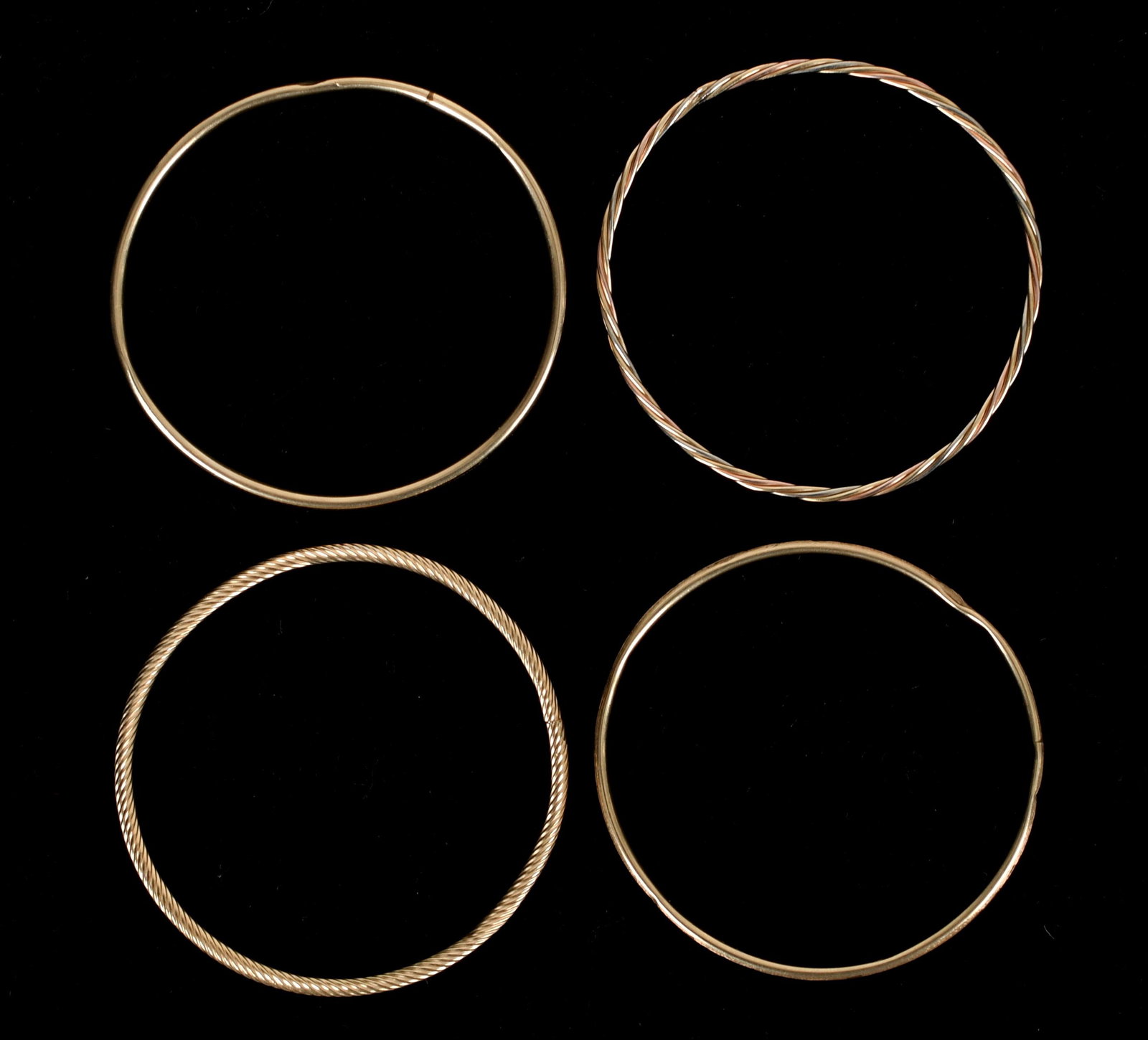 A Set of Four 14K Gold Bangle Bracelets (1 of 9)