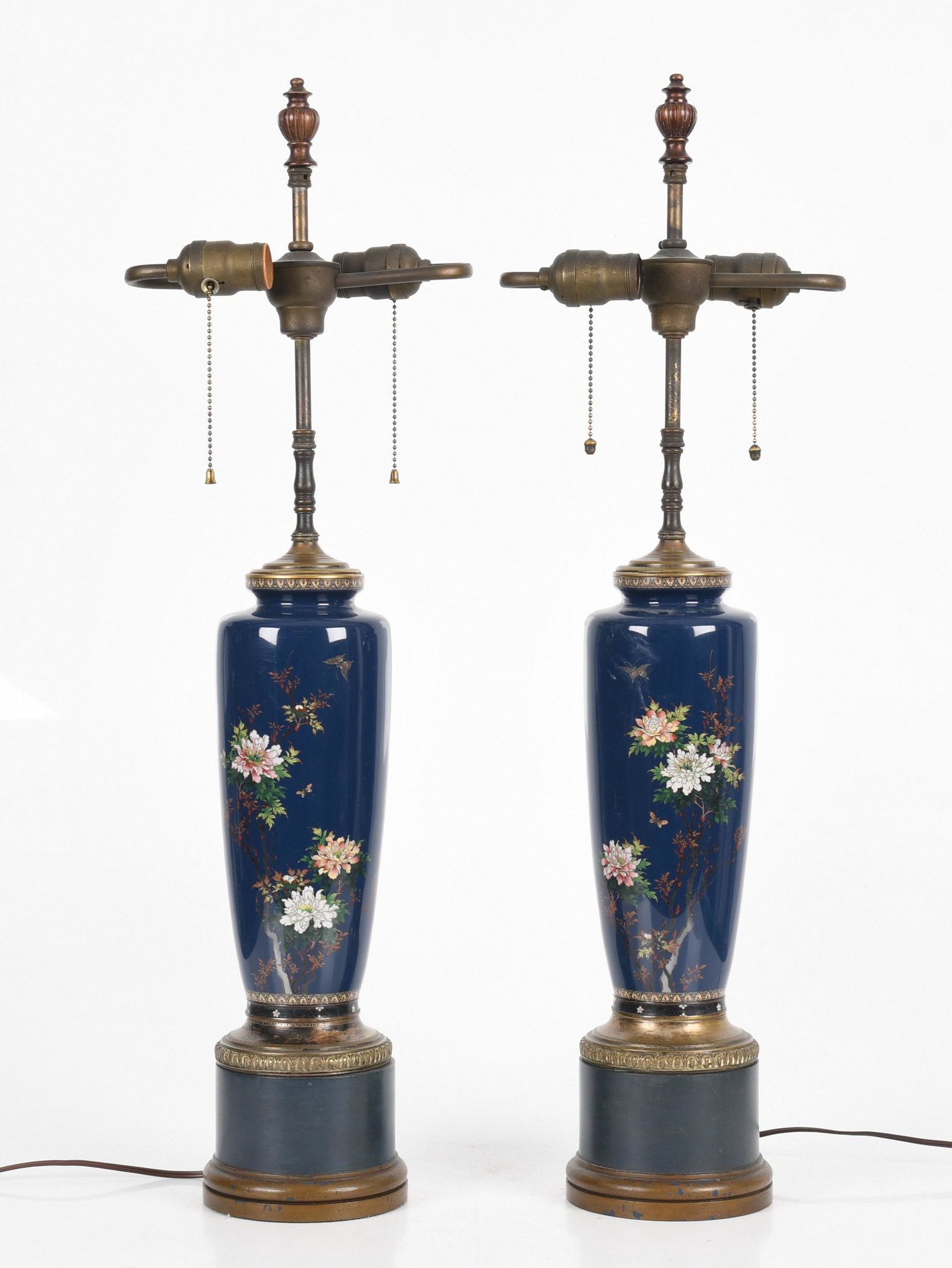 A Pair of Japanese Cloisonne Vases/Lamps: Early 20th century, each with a blue ground and floral decoration. Mounted with silvered bronze. Dimensions:Each is 6" in diameter and 31" tall. Provenance:From a Bucks County collection.
