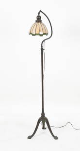 Handel Bronze Bridge Floor Lamp, Slag Shade: The Handel Lamp Company patinated bronze bridge floor lamp, Meriden, Connecticut, early 20th century, the caramel and green leaded glass shade supported by an adjustable tripod lamp base with spade fe