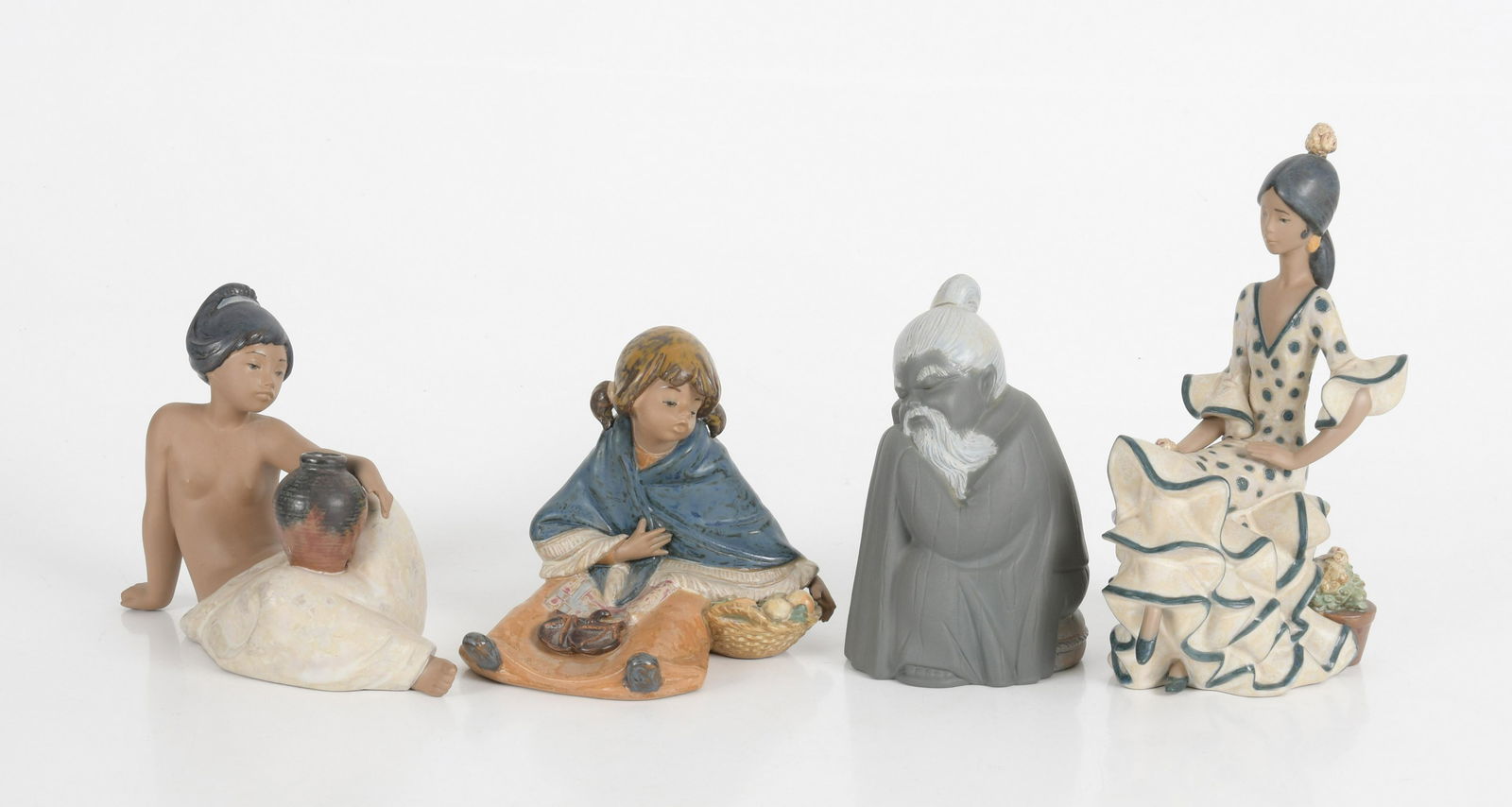 Four Lladro Earthenware Figural Groups: Four Lladro earthenware figural groups, late 20th century-modern, comprising three female groups dated for 1984, 1985 and 1986 and an 'Ancient Orient Short Chinese Figurine' group, each with blue prin