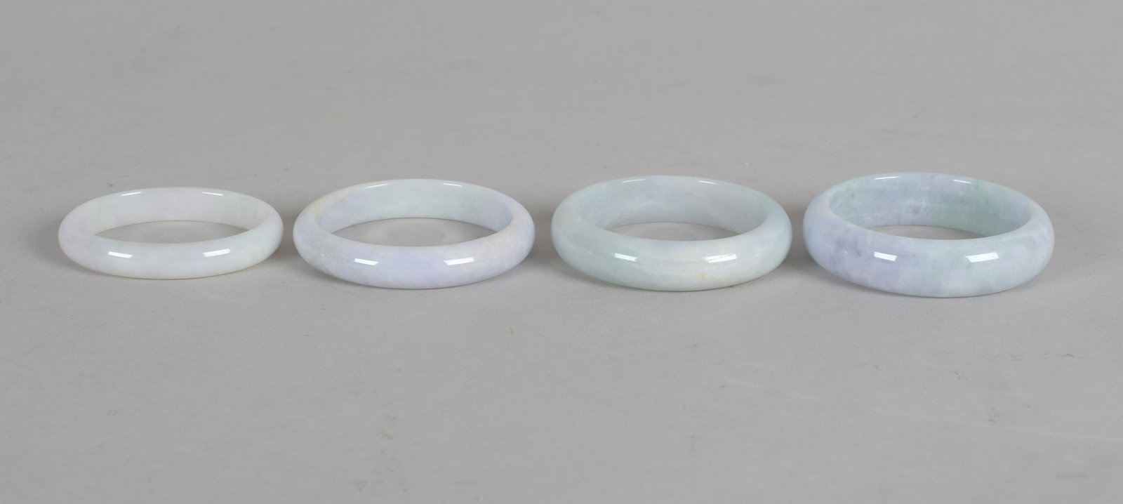 Four Carved Jade Bracelets (1 of 7)