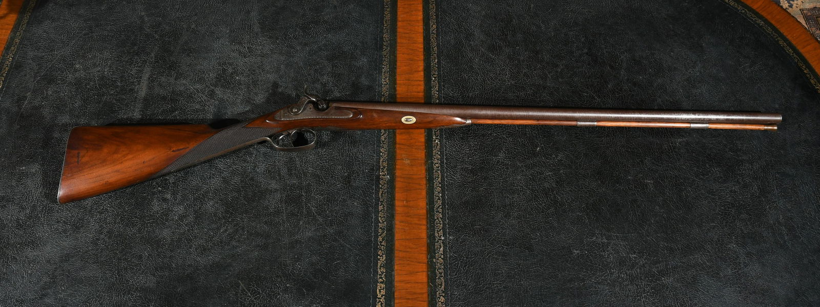 A Shotgun by John Thomson: Marked for John Thomson, Edinburgh. Circa 1810, converted to percussion. With damascus barrels and engraved lock. Dimensions:30" barrel, the total length is 46". IMPORTANT NOTE: ALL preview and pickup