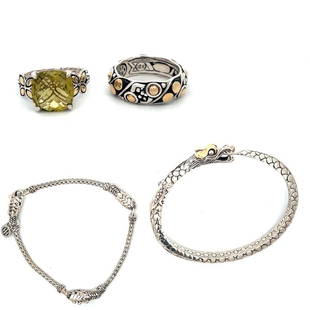 John Hardy Sterling and 18k Gold Jewelry: A four piece lot of signed John Hardy jewelry. There are two dragon bracelets (Legends of Naga Collection) and two rings.Dimensions:The rings are size 6 and 7, both bracelets are 7" in circumference.