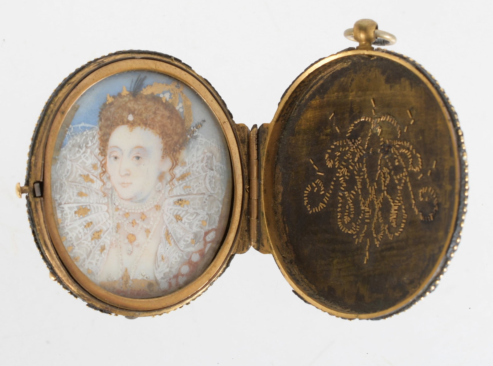 A Portrait Miniature of Queen Elizabeth I: A hand painted portrait of Queen Elizabeth I in a metal locket case that features decoration and monogram in applied gold. The case was originally covered in leather which has mostly worn away.&n