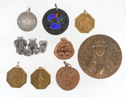 Group of Pendants & Medals: Comprising: a French silver pendant, an unsigned bronze pendant with abstract enamel decoration, two copper pendants marked for Guivre, a large French religious medal, a sterling silver brooch decorat