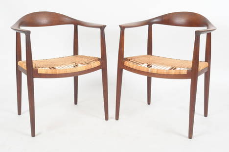 Hans Wegner, Pair 'The Chair' Johannes Hansen: Hans Wegner (Danish, 1914-2007) Pair of Teak and Caned 'The Chair' Chairs for Johannes Hansen, Copenhagen, Denmark, Mid 20th Century. Model JH501, designed 1949. Each branded 'JOHANNE