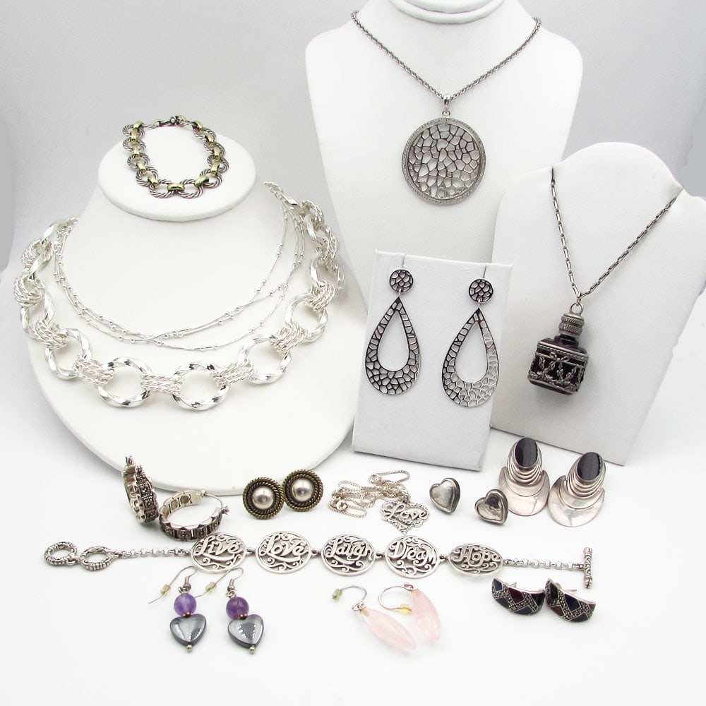 Fifteen pc Lot Designer Gurhan Sterling Silver Jewelry: Lot includes many signed pieces including Gurhan, a bracelet with 14K Gold and sterling silver links. The lot includes. Five – NecklacesTwo- BraceletsEight pairs of pierced earrings.The per