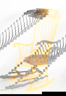 Painted and Stencil Decorated Windsor Rocking Chair: A Yellow-Painted and Stencil Decorated Seven-Spindle Back Windsor Rocking Chair, 19th Century. Dimensions: Height 45in; width 22 3/4in; depth of seat 17in; seat height 18in. Provenance: Property