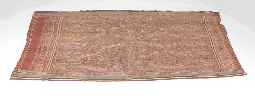 Pua Kumbu, Malaysian Borneo, Textile: Pua Kumbu with a serpent pattern (buah nabau) Iban Dayak, Sarawak, Malaysian Borneo, Cotton; warp ikat. Late 19th / early 20th Century Dimensions: 97 1/2" x 51 1/2". 