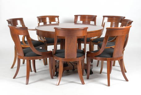 Baker Furniture Neoclassical Style Cherry Dining Suite: A Baker Furniture Neoclassical Style Cherry Dining Suite, 20th Century. Comprising six side chairs, pair of armchairs, and a circular extension dining table. Each with an applied manufacturer's label