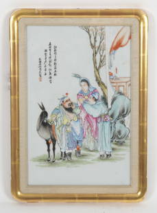 A Chinese Porcelain Panel: A Republic period famille rose plaque depicting three figures and a donkey. Dimensions: The frame is 17 1/2" x 12 1/2". 