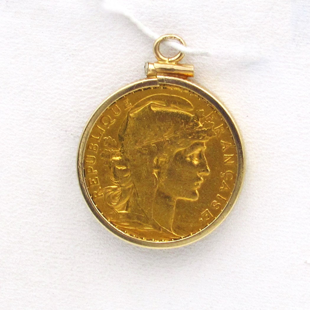 1904 France Gold 20 Francs Rooster Coin Pendant: 1904 France Gold 20 Francs Rooster Coin set into a 10K yellow gold bezel holder Minted in Paris. Hallmark: 10K Gross Weight: 4.8dwt / 7.4grams 