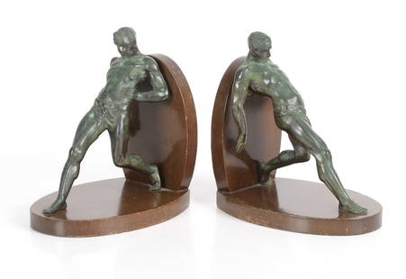 A Pair of Bookends After Max Le Verrier: A pair of patinated spelter bookends on wooden bases, first half of the 20th century.&nbsp; Dimensions: each is 7&quot; x 5&quot; x 7 1/2&quot;.&nbsp; Provenance: Property from a Local Collection.