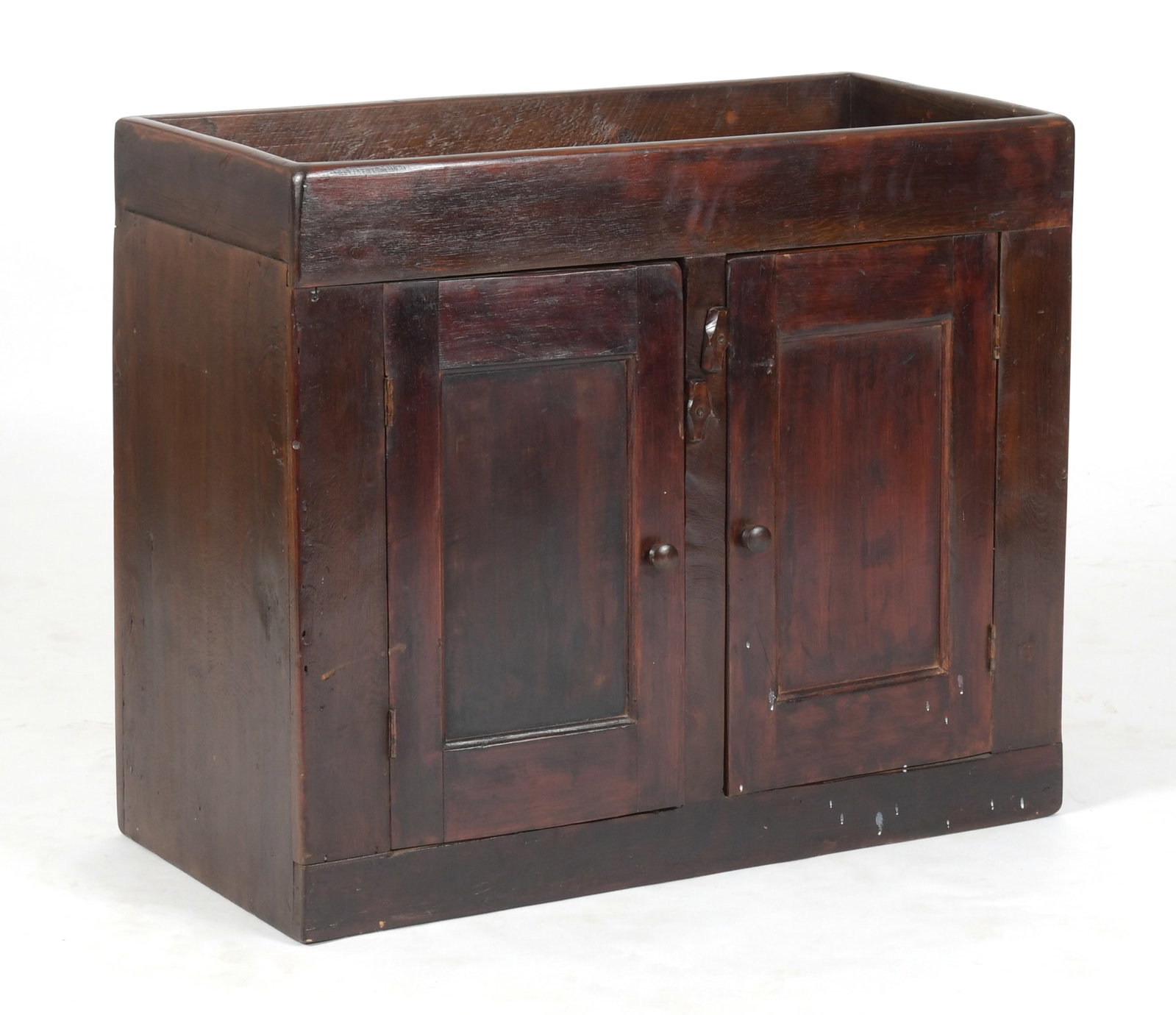 American Country Style Softwood Dry Sink: An American Country Style Softwood Dry Sink, Composed of Antique and Later Elements. The open top over a pair of sunken paneled cupboard doors, enclosing a single shaped shelf. Dimensions: Height