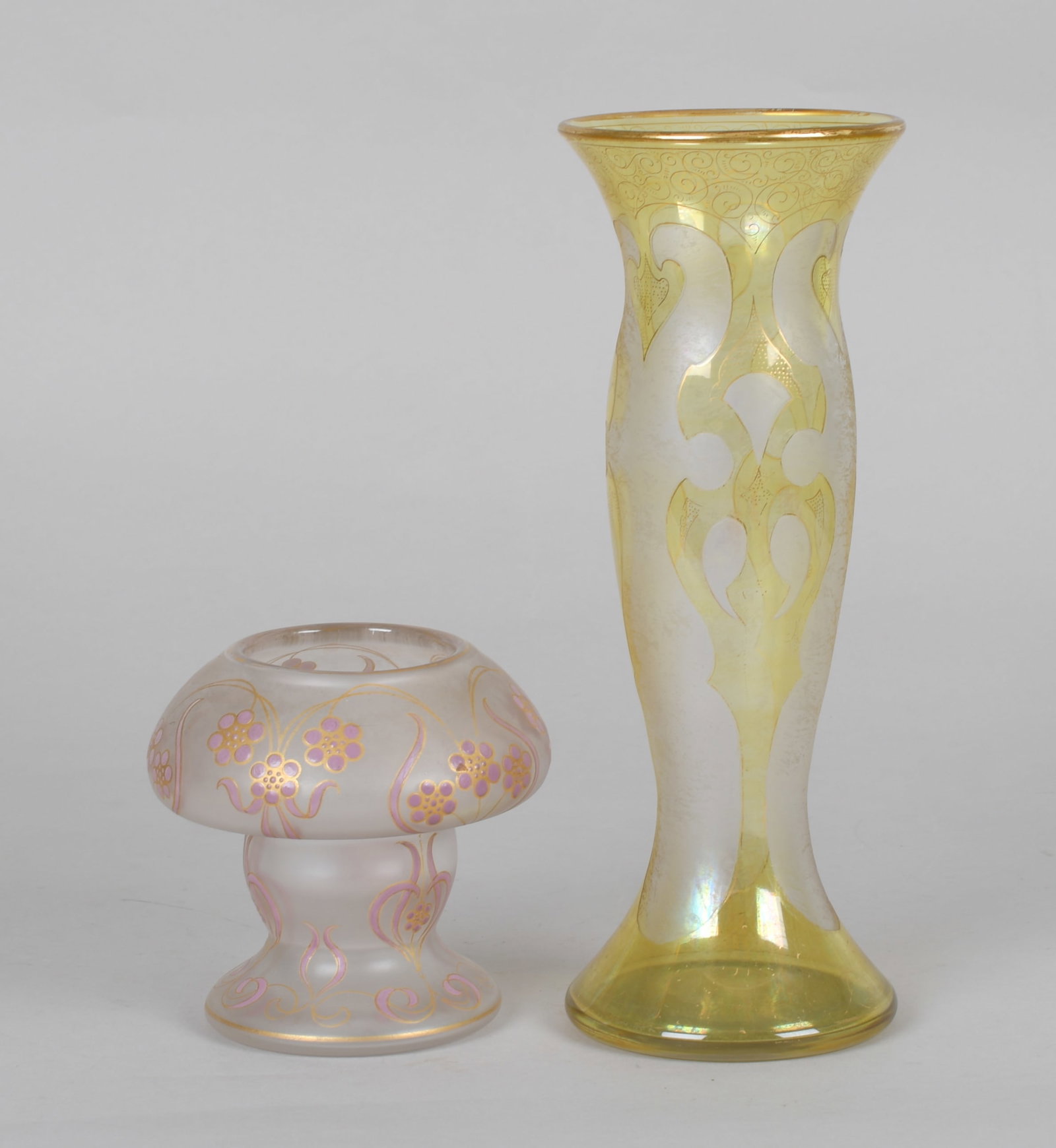 Two Honesdale Art Glass Vases: Two cameo glass examples with acid etching and gilt elements. Both signed. Dimensions: The smaller is 6" diameter, 6" tall. The larger is 5" diameter, 13" tall. Provena
