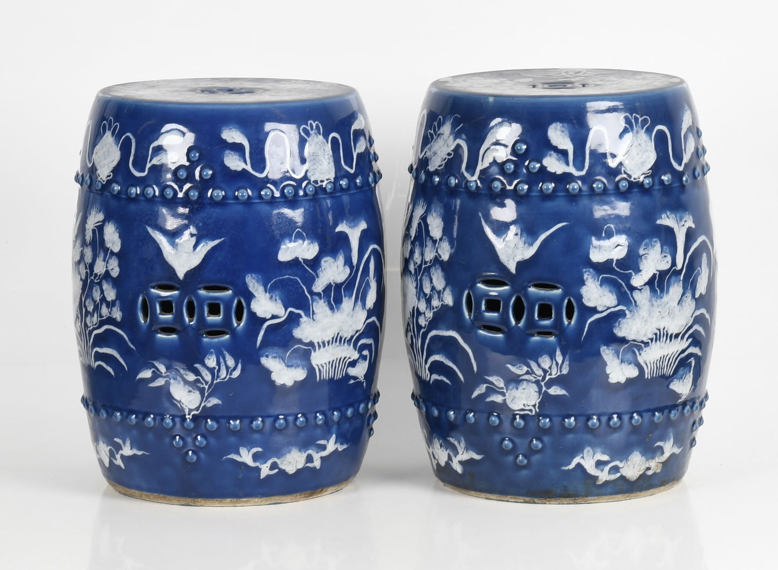 Pair of Chinese Blue and White Porcelain Garden Seats, Qing Dynasty: A Pair of Chinese Blue and White Porcelain Garden Seats, Late Qing Dynasty. Drum form, with typical figural and floral decoration including insects and birds. Dimensions: Height 19in; diameter 14