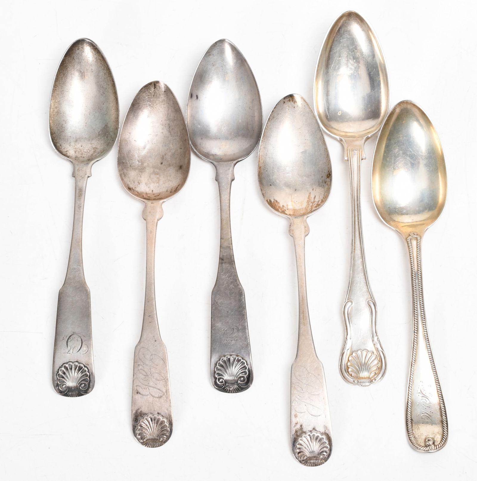 American Coin Silver Tablespoons: American Coin Silver Tablespoons. Six examples, makers include Wolcotts and Gelston, J.B. Jones, A.E. Warner, C.H. Mumford, and G. Kippen. Dimensions: 8in to 9in, the total approximate we