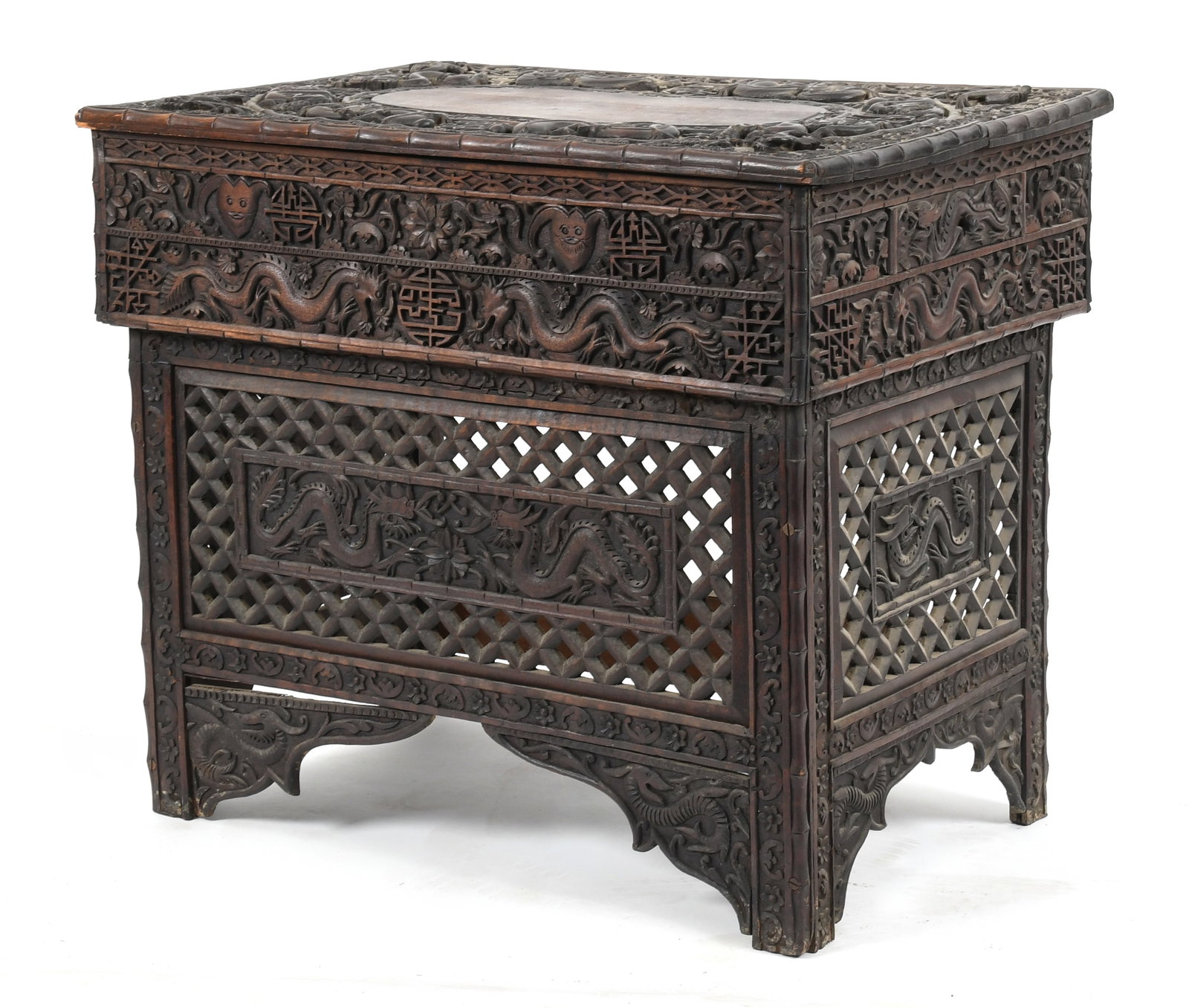 Chinese Carved Rosewood Folding Traveling Desk: A Chinese Carved Rosewood Folding Traveling Desk, Late 19th / Early 20th Century. Profusely carved overall having pierced sides, fitted with a small drawer to either side. Dimensions: Height 25 1/2in;
