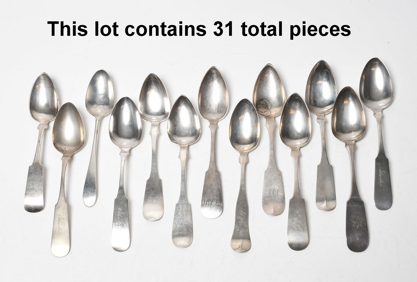 A Large Group of American Coin Silver Tablespoons: A Large Group of American Coin Silver Tablespoons Makers include: John Gorham, David Smith, Albert Titcomb, S.H. Elliot, George King, William and George Sharp, George Kippen and William Wordin,