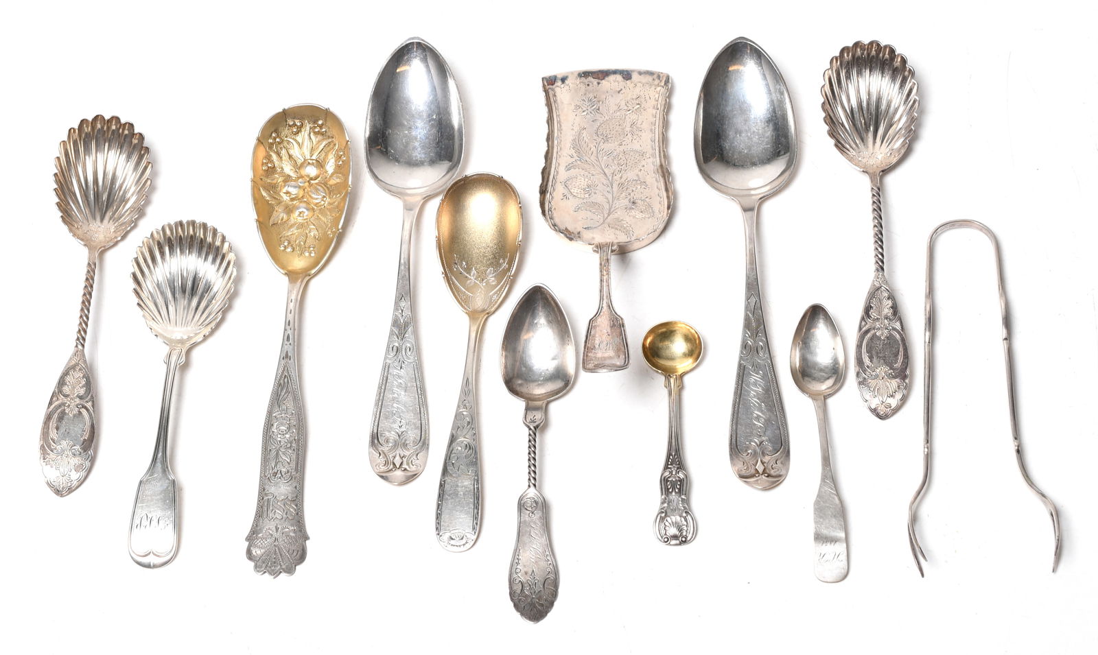 A Group of American Coin Silver Flatware, Serving Pieces: A Group of American Coin Silver Flatware, Serving Pieces Comprising: a pair of George Sharp sugar shells, a single George Sharp sugar shell, a spoon by Robert Wilson, a pair of unmarked tongs, a